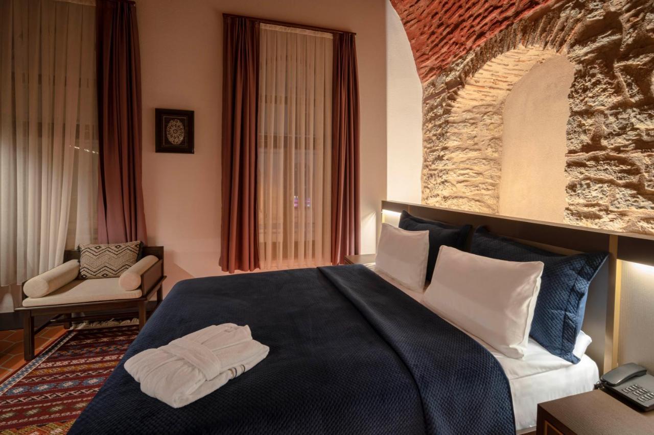 Han 1772 Hotel Стамбул Экстерьер фото A bedroom at the hotel